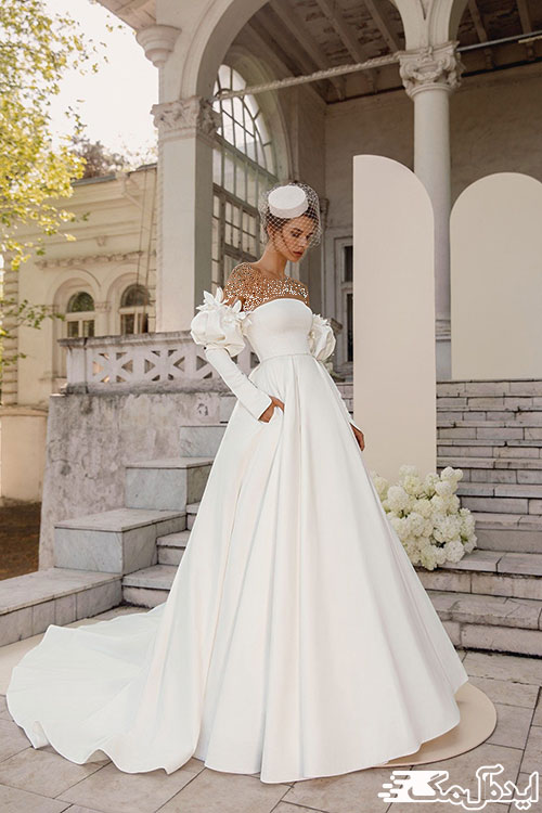 طراحی ترکیبی آستین‌ها و استفاده از کلاه، از ایده‌های خاص لباس عروس برای افراد خاص‌پسند