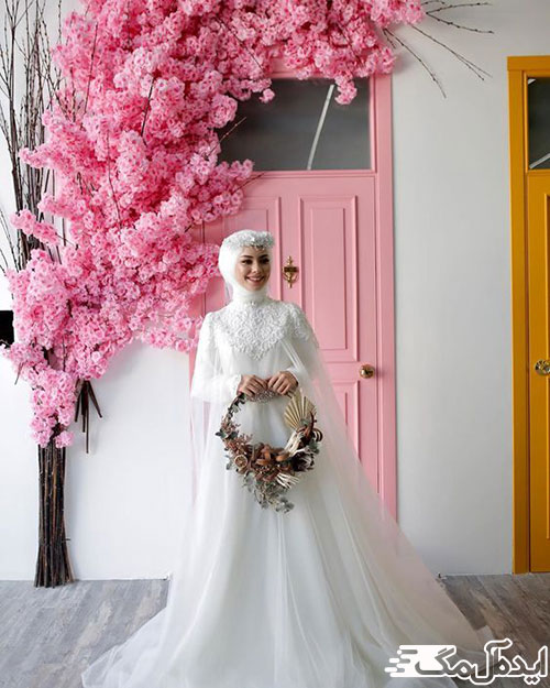 عکس زیبایی از یک عروس محجبه با حلقه گل
