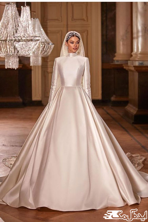 زیبایی و سادگی با یک مدل کاملا پوشیده لباس عروس با ساتن براق