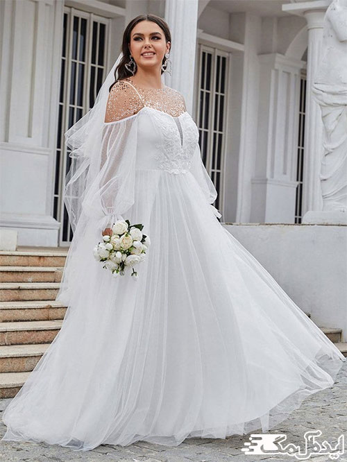 استفاده از آستین‌های افتاده و پفی تور با دامن نیمه‌پفی برای لباس عروس‌های سایز بالا
