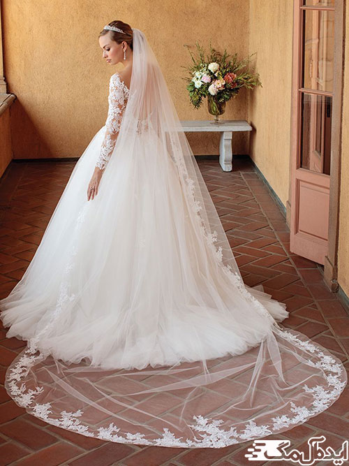 لباس عروس زیبای پفی با آستین‌های بلند دانتل