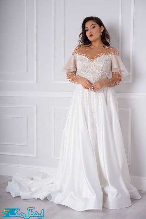 یک مدل لباس عروس سایز بزرگ با آستین‌های کوتاه کلوش