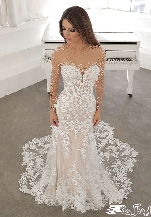 پارچه دانتل زیبا و استفاده هوشمندانه از آن برای تزئین حاشیه‌های لباس دکلته عروس