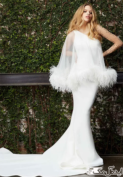 شکوه و زیبایی لباس مجلسی سفید با دنباله بلند و تزئین پر