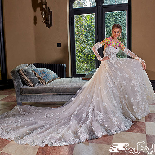 استفاده از پارچه توری با گل‌های سه بعدی در زیباترین لباس عروس های سال 2023