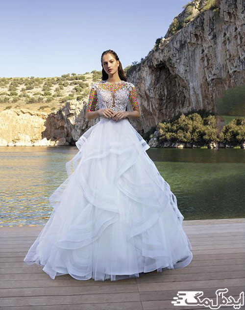 دامن آبشاری و بالاتنه کار شده در لباس عروس سال 2023