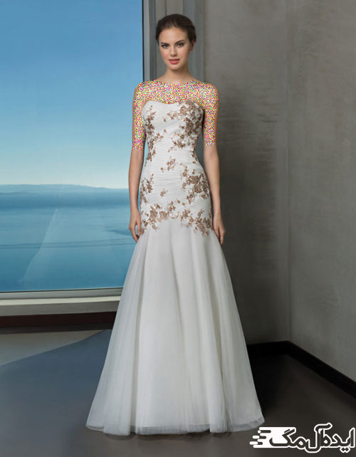 یک مدل اندامی زیبای لباس عروس با ترکیب پارچه‌های گلدار رنگی و تور ساده