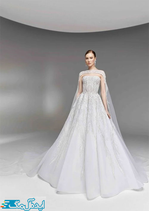 یک سبک مینیمال و خاص از لباس عروس شنل‌دار 2023
