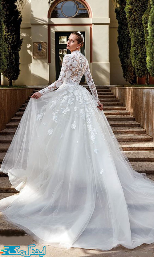 مدل لباس عروس پرنسسی 2023 با بالاتنه طرح تور و گل‌های سه بعدی