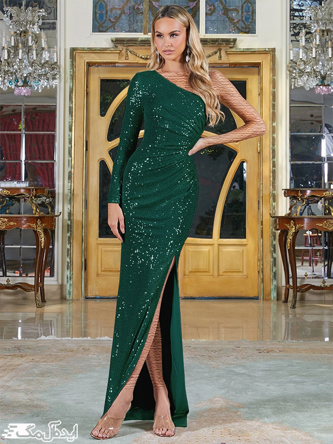 لباس مهمانی زنانه سبز شاین دار با چاک در قسمت پهلو و آستین‌های نامتقارن